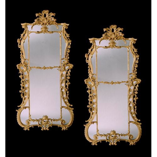 A PAIR OF GEORGE III CARVED GILTWOOD MIRRORS